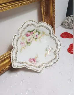 Royal O & E Leaf shaped trinket dish with pink and yellow with gold trim and flowers
