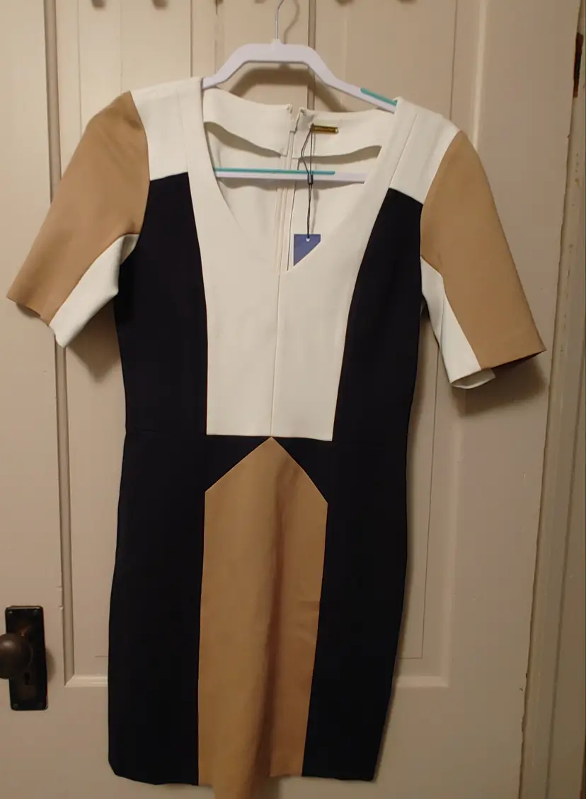 Dress- Brand: Rebecca Minkoff. Size 8. NWT. Retail $298. Colorblock navy, camel and moon. 72% rayon, 23% nylon, 3% spandex. No callouts.
