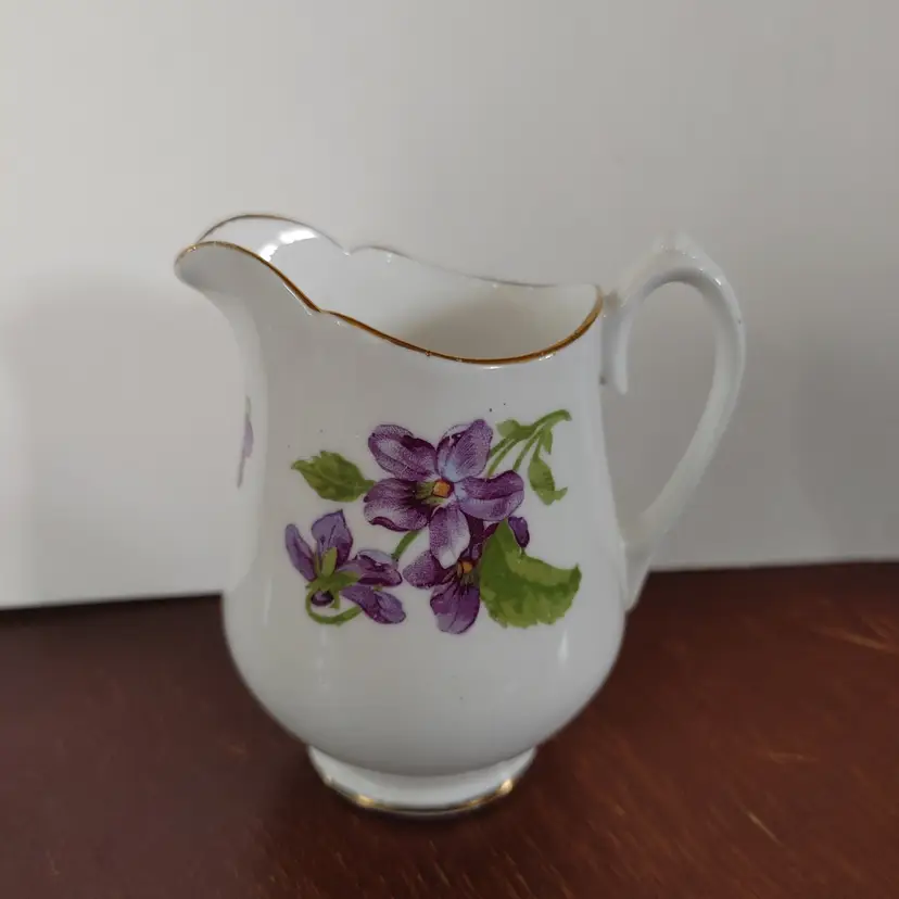 Melba Bone China Creamer with Violets. Made in England. No chips or cracks. 3.5 inches high.