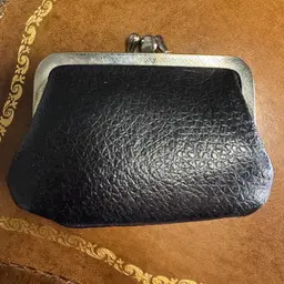 Vintage black leather kiss lock coin purse with 2 compartments 4” w 3” t
