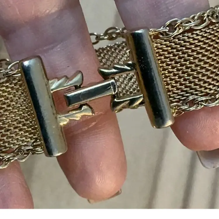 Vintage Goldette mesh bracelet with floral embellishments and faux pearls With A Fold Over Clasp 1950’s