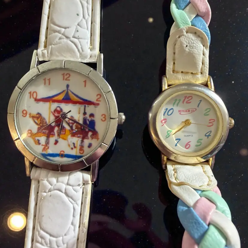 2 Fun Working Watches  - 1 Carousel- Leather Bands Show Wear and Need Cleaning Or Replacement- But Faces Are Cute