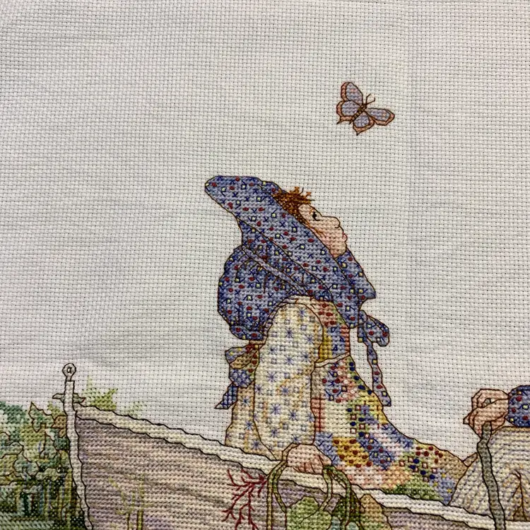 Hand Cross-Stitched Holly Hobbie in Boat