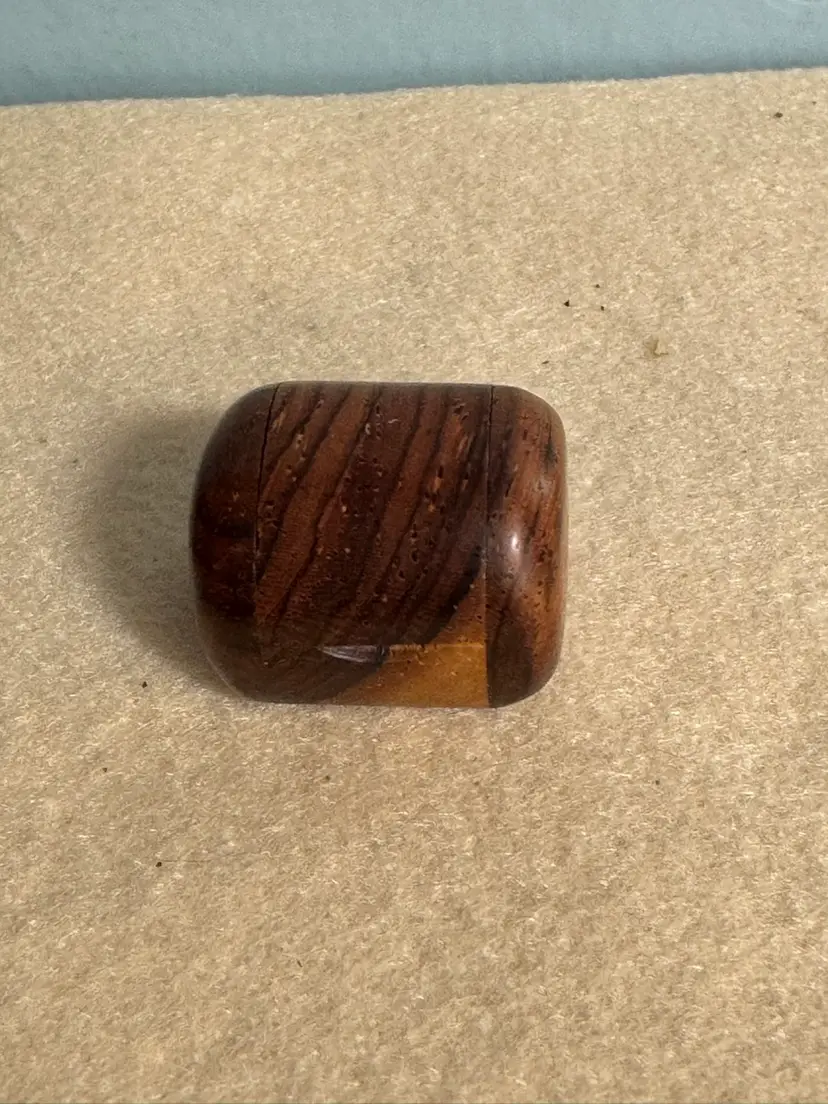 Polished Mini hardwood trinket box with visible grain patterns