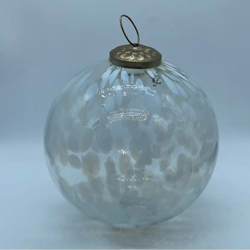#1222 A six-inch handblown clear glass orb ornament with white speckled inclusions Celestial 6”