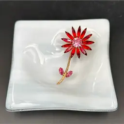 A Set Of Two White Slab Trinket Dish With A Heart/Red And Pink Flower Brooch With Gold Tone Metal Has A C Clasp