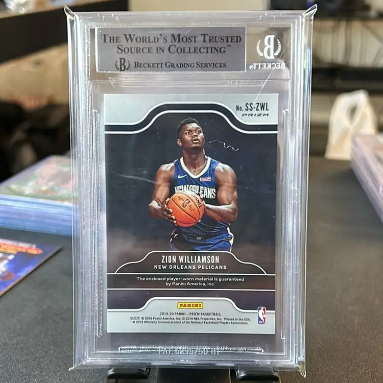 2019-20 Prizm Zion Williamson RC Sensational Swatches Orange Ice Prizm BGS 8.5