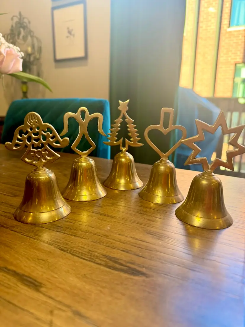 5” tall set of 5 vintage solid brass Christmas bells w/various holiday-themed cutouts