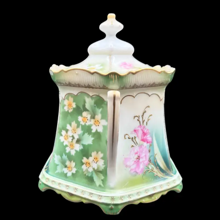 #177A Vintage R S Prussia Porcelain Cracker/Biscuit Jar With Handles. Features Pink and Yellow Floral Design on White and Green Background with Gold Accents. There Is A Chip On The Inside Rim Of The Jar See Pictures.