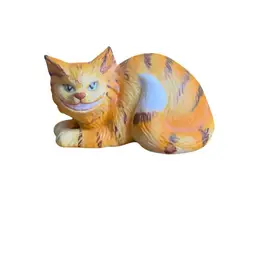 Grinning tabby cat ceramic