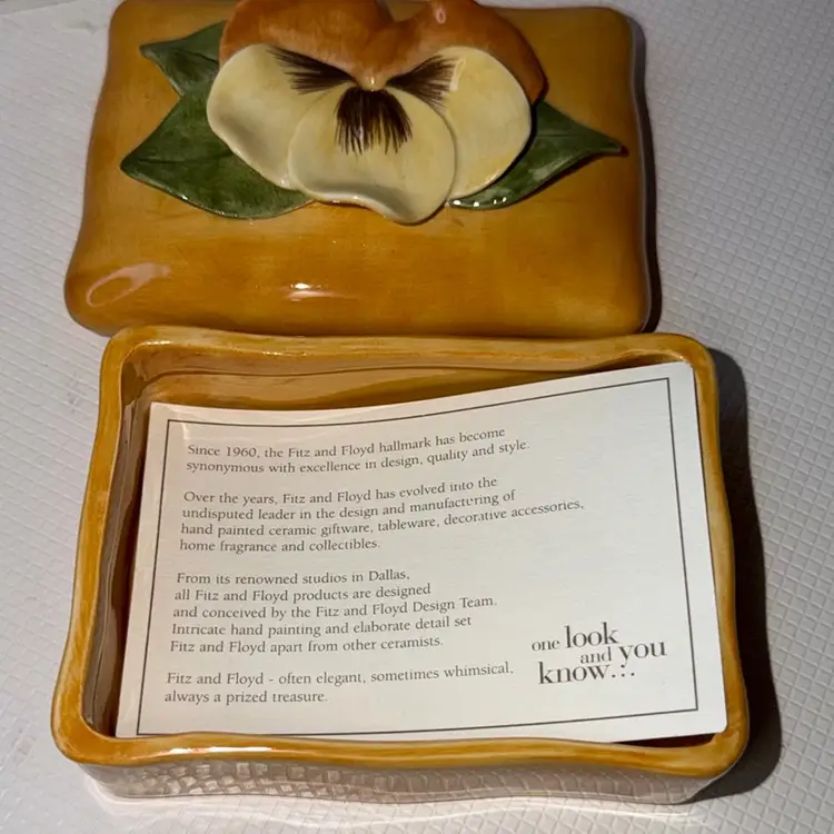 Fits And Floyd Trinket Dish With A Flower On It