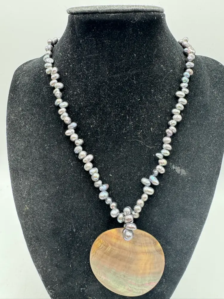 # 53 Mother Of Pearl Pendant On A Genuine Oil Slick Pearl Necklace 16”