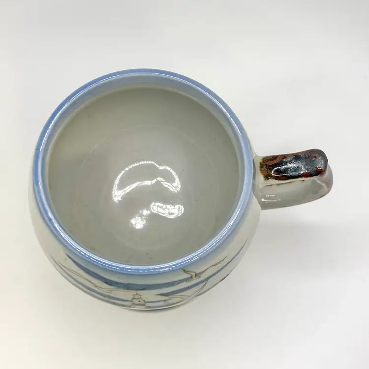 Footed Shorebird Lighthouse Stoneware Mug 4"