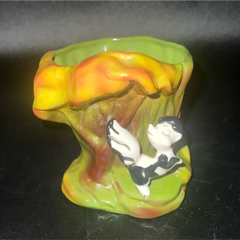 vintage Shawnee Pottery "Stinker" little skunk planter or vase, likely from the 1950s