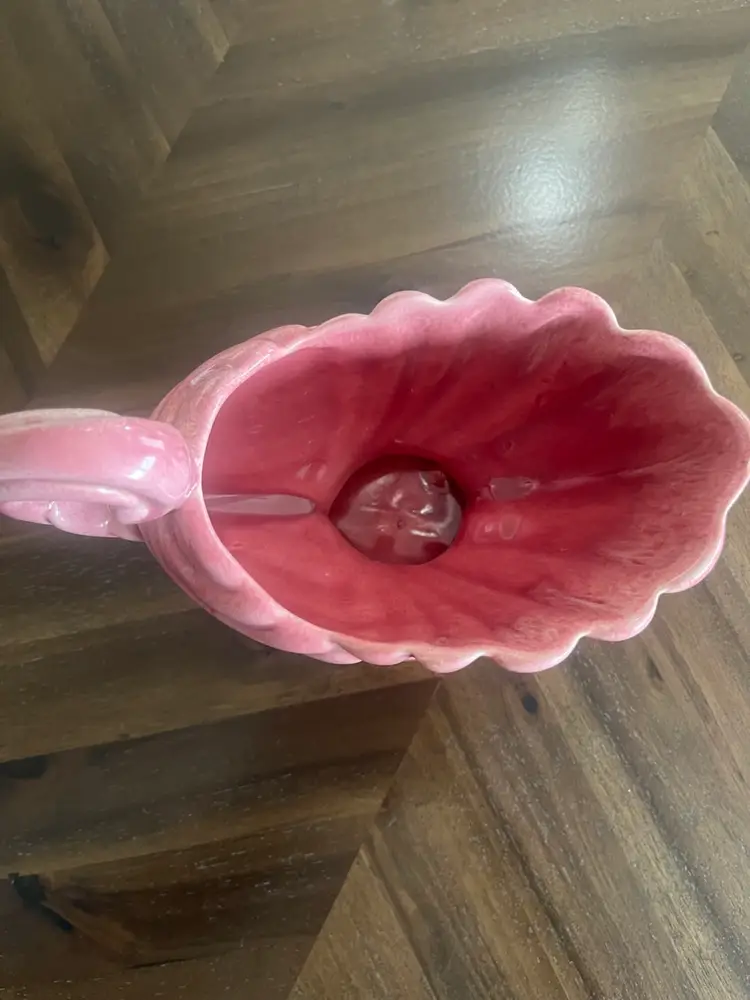 Vintage pink ceramic Haeger cornucopia shell planter with scrolled handle.  7” Wide By 4” High