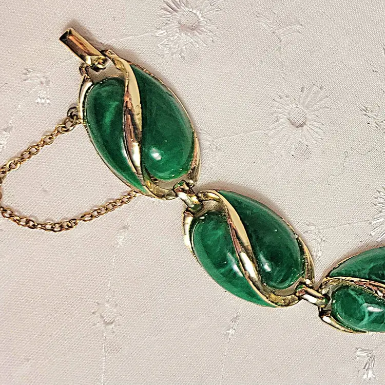 Pat. PEND faux green malachite and goldtone bracelet with safety chain