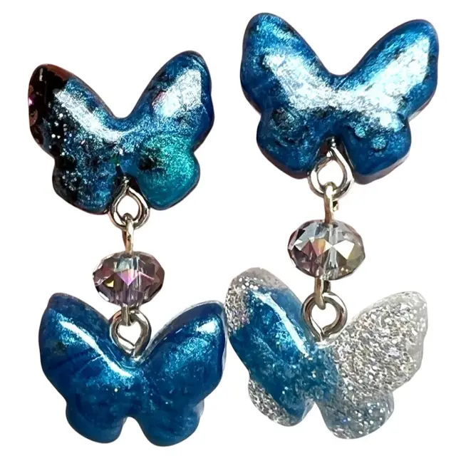 Butterfly & Crystal Dangle Earrings. Handmade By Me! Stainless steel stud posts. Made With Resin and Glitter. 1-1/4” Length