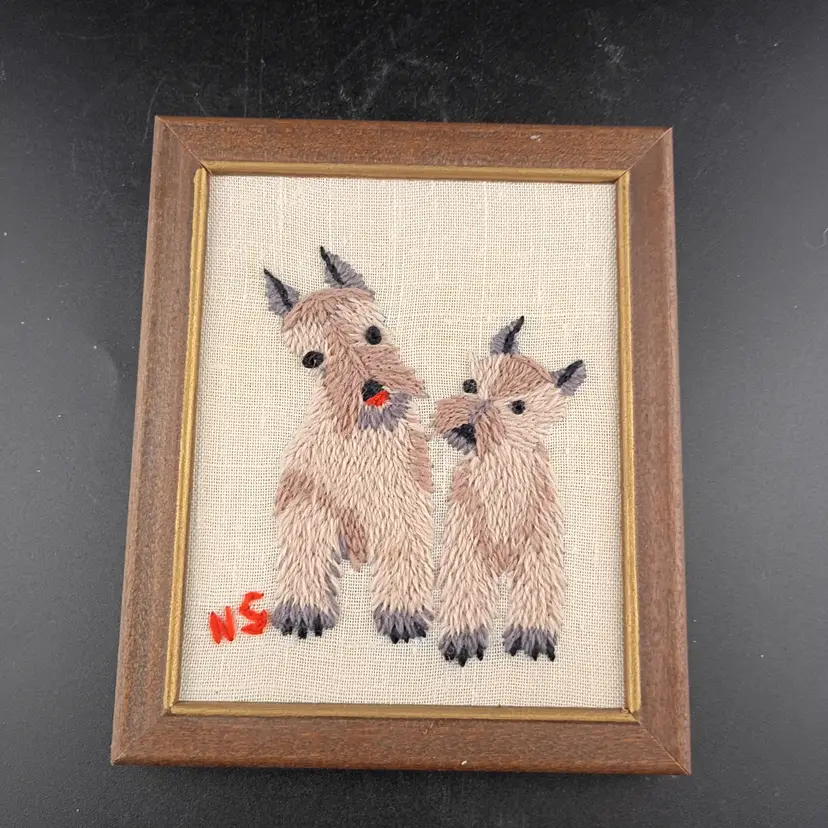 Vintage framed needlepoint of two dogs, 1976