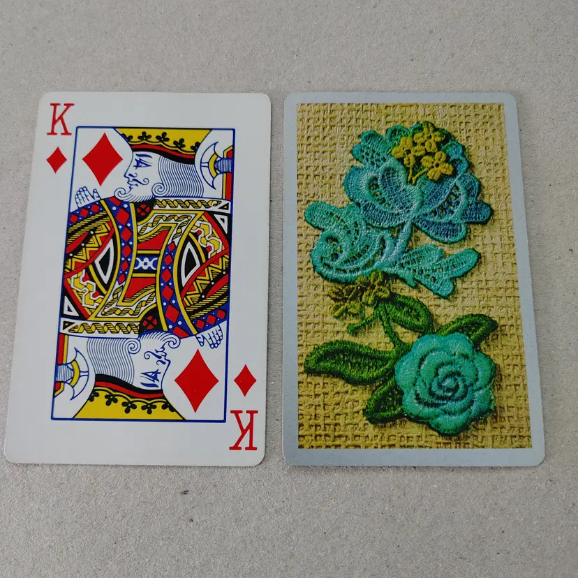 1 Single Swap Card - Playing Card. Blue floral applique with lace card. Weave background. Made by Congress in OH. Dimension 2.5 x 3.5. Read description.