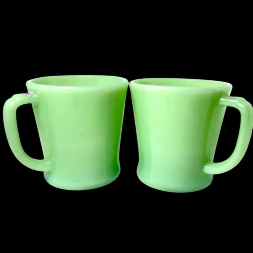 Jadeite Green Fire-King Iconic D-Handle Coffee Cups Mugs. Set Of 2. Stamped On Bottom: OVEN Fire-King WARE MADE IN U.S.A. Vintage Circa 1951-1960. 3-1/4” tall.