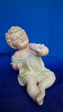 Vintage Piano Baby Girl Figurine | Bisque Porcelain Baby with Rattle