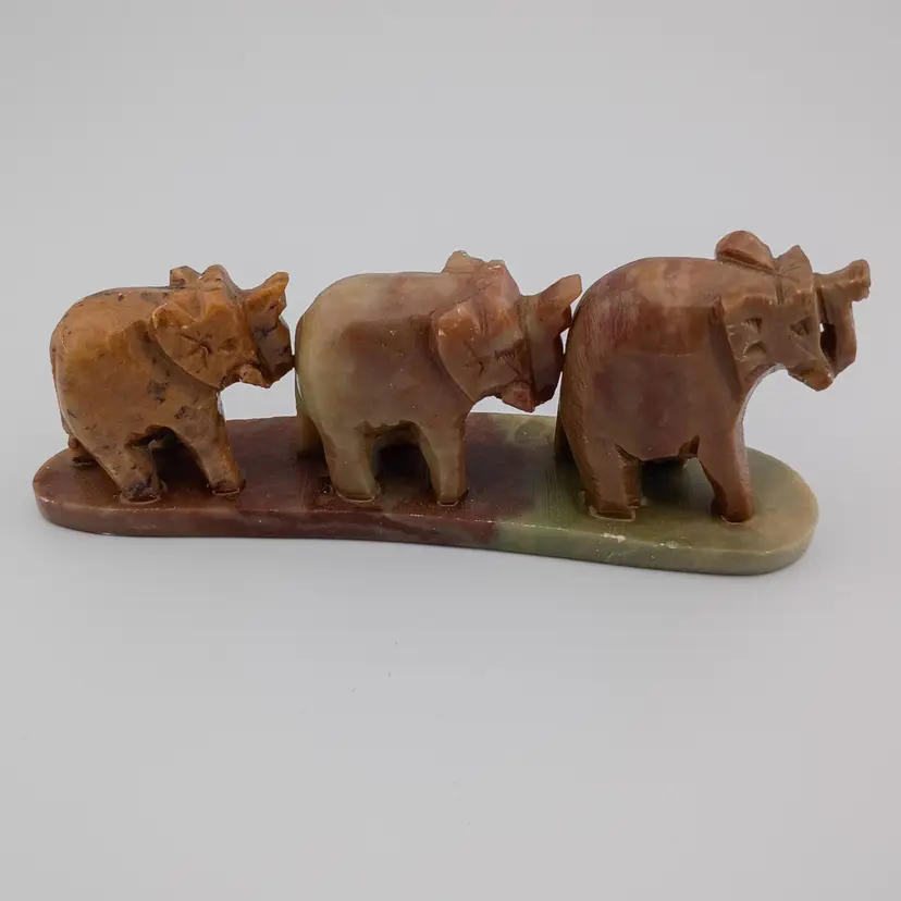 Carved onyx elephant train