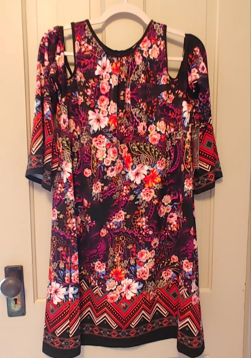Dress- Brand: Beige by ECI. Size Large. NWT. Floral dress with cold shoulder. Material: 95% polyester, 5% spandex. No callouts.