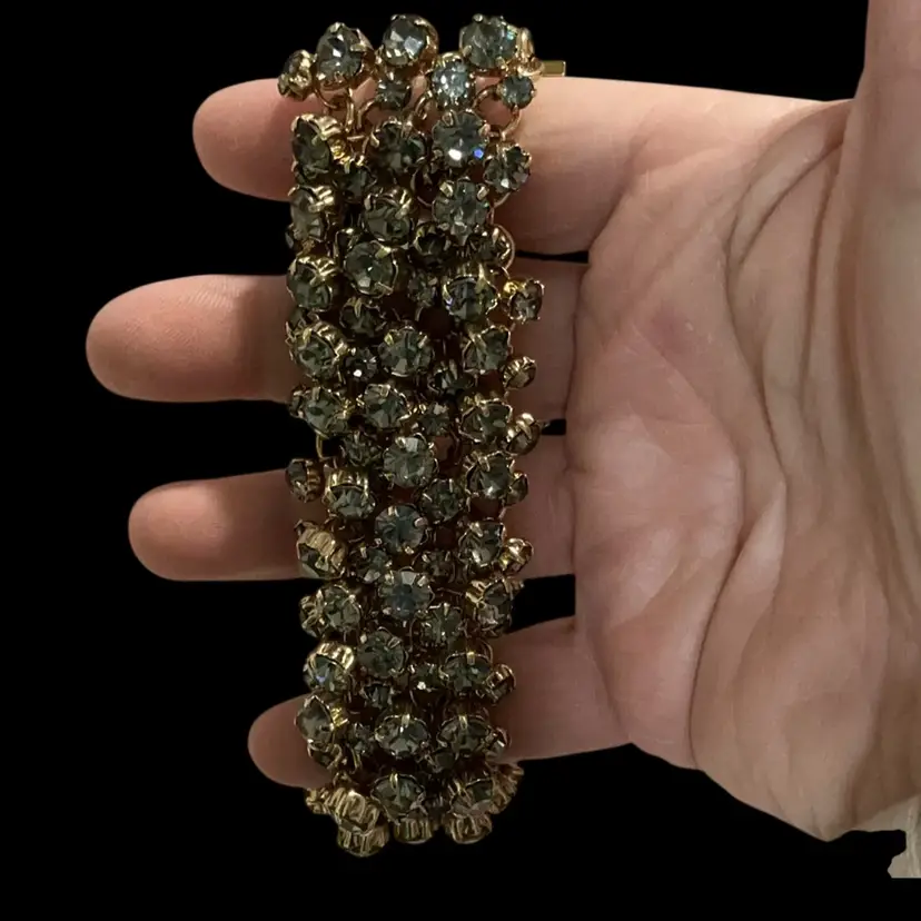 Large Weighted Goldtone Cha Cha Bracelet. With Blue Prong Set Glass Rhinestones. Not Signed