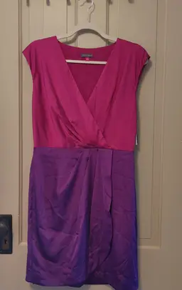 Dress- Brand: Vince Camuto. Size 8. NWT. Retail $140. 2 tone purple dress. Shell- 97% polyester, 3% spandex. Lining- 100% polyester. No callouts.
