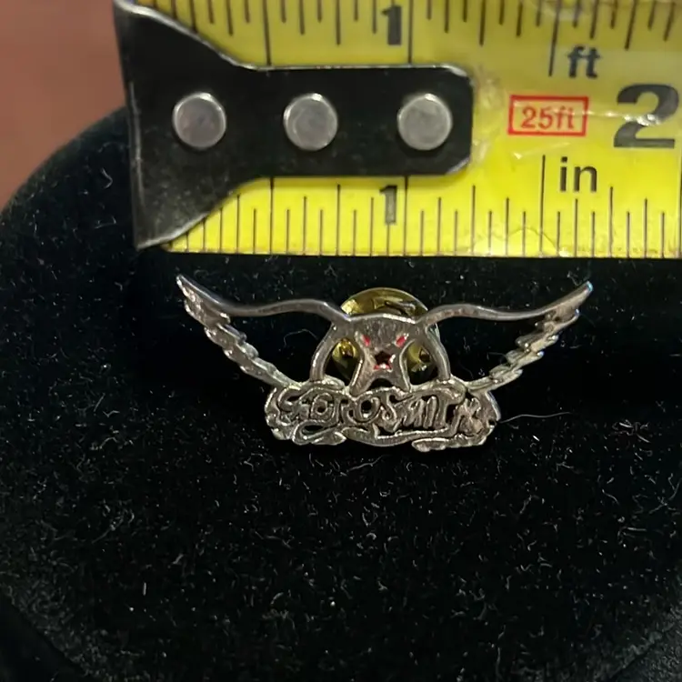 Vintage Aerosmith Pin. Great Condition. Gold tone. 2inch Wide