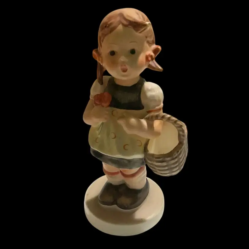 Vintage Goebel M. J. Hummel Figurine. Named “ Sister “ Or Sometimes Referred To As Girl With Basket & Flowers. Model # 98 Highly Collectible. Produced By German Company Goebel. Based On Art Of Sister M. J . Hummel.