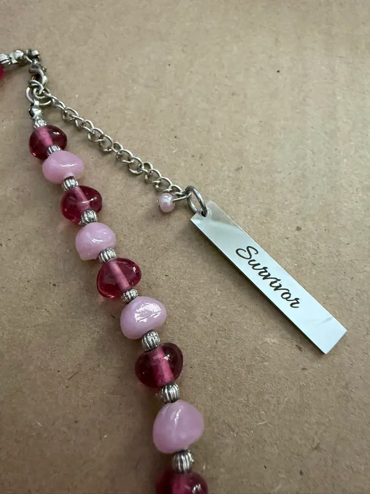 Breast Cancer Awareness / Survivor Necklace - Glass Beads In Pinks And Silver Tone With Teardrop Pendant And Silver Tone Survivor Charm.