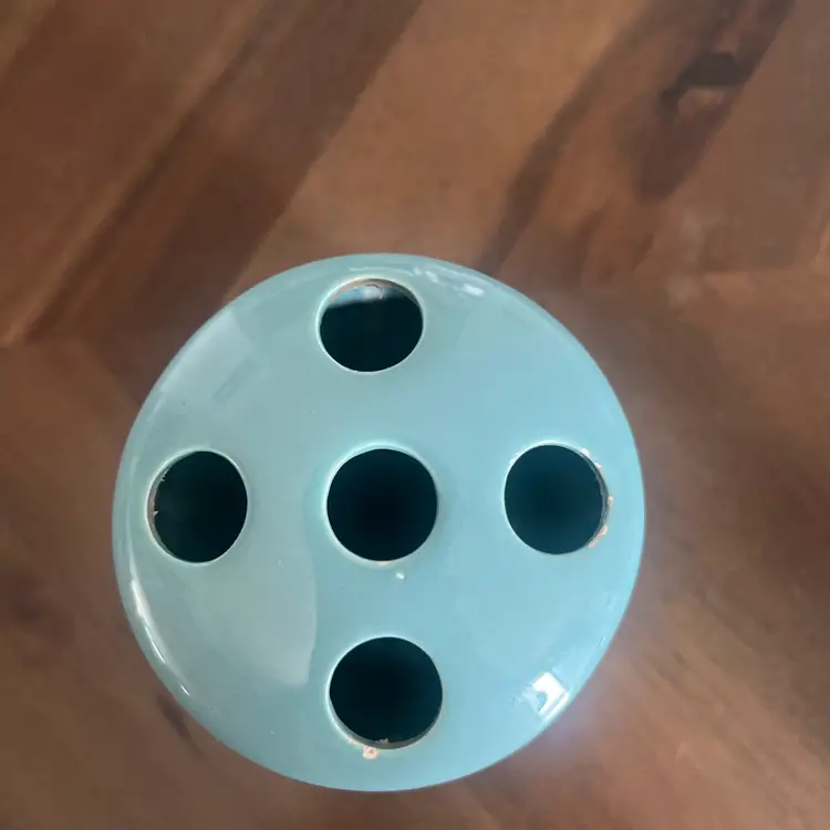 A vintage ceramic swan Towel  holder with matching toothbrush holder and soap dish.