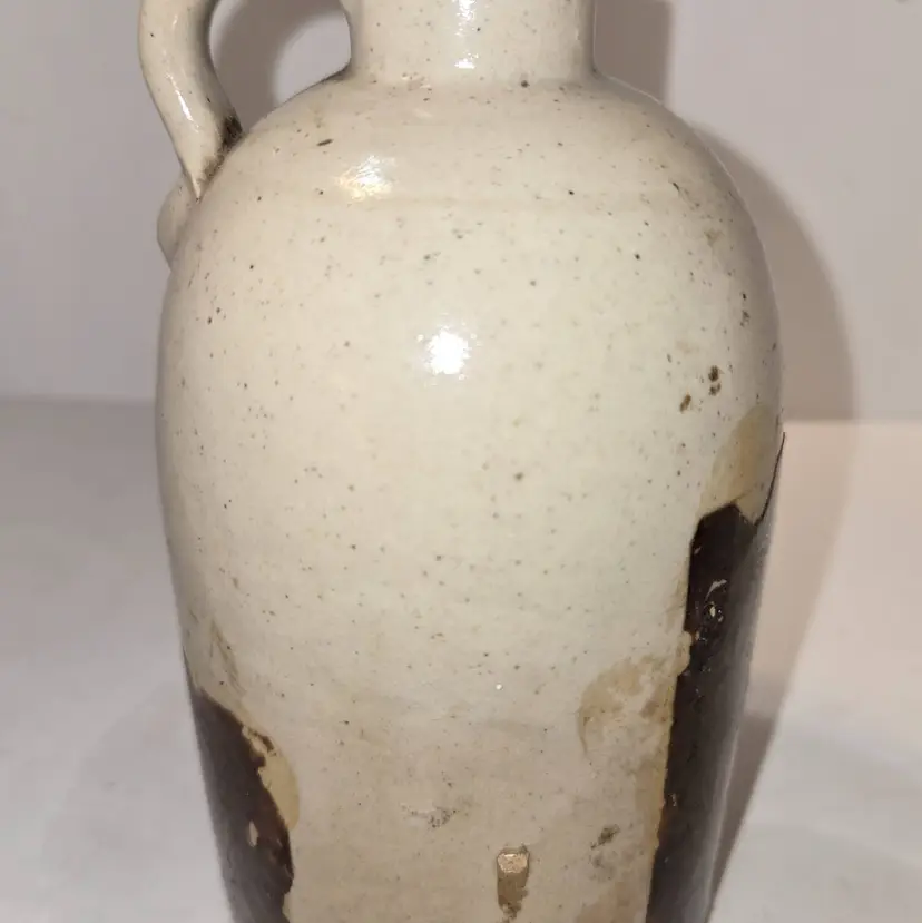 Antique Jug used for transporting liquids like whiskey, Syrups and sometimes healing tonics