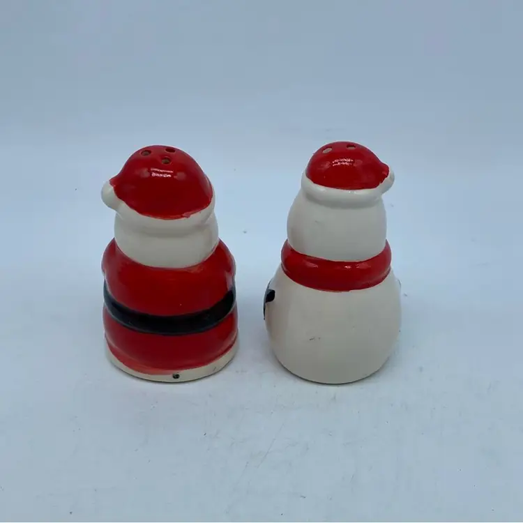 #2906 Ceramic Santa Claus and snowman holiday salt and pepper shakers 4” x 2”