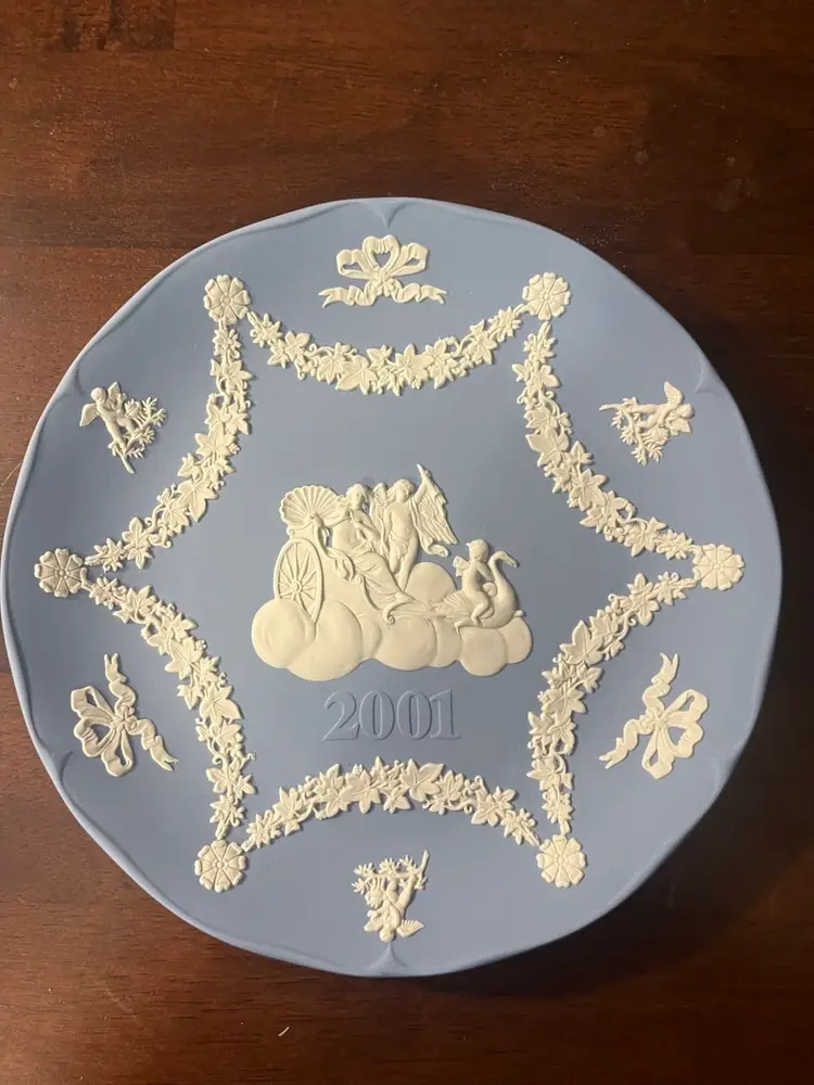 A Wedgwood blue Jasperware 2001 annual decorative plate. 7.25”