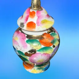 Mini Porcelain Urn With Florals And Gold Trim. 2.5” Tall