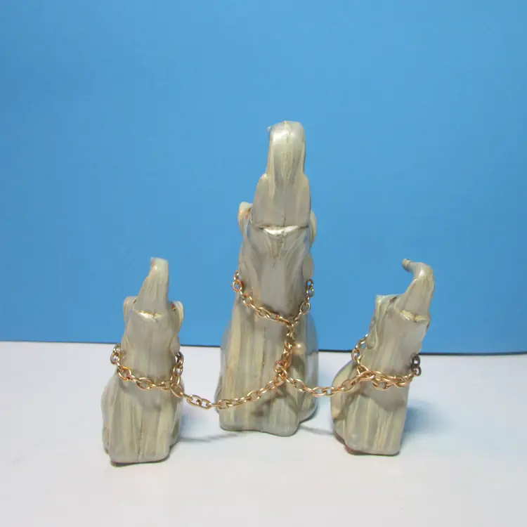 vintage faux wood elephant on chain family figures