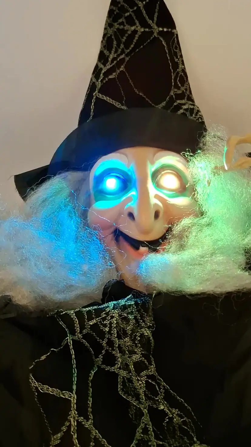 Halloween Hanging Witch. LED Color Changing EYES just under 3 ft.