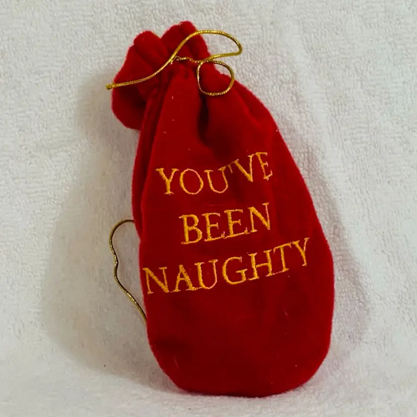 Red Bag With 2 Lumps Of Coal “You’ve Been Naughty” Christmas Ornament Approximately 5.5 Tall And 3” Wide