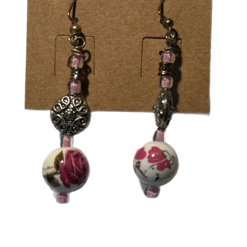 Handmade Earrings with Silver and Pink Beads and a Flowered bead.