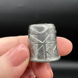 007. Pewter (?) Geometric Design Thimble Signed MJ 82