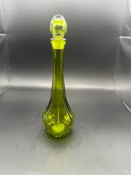 A36 Vintage green glass Avon
"Potion" bottle