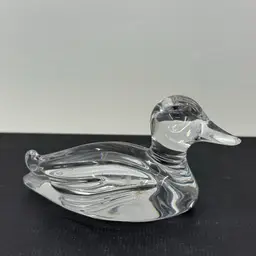 A clear lead crystal duck figurine made by Princess House. Made In West Germany.