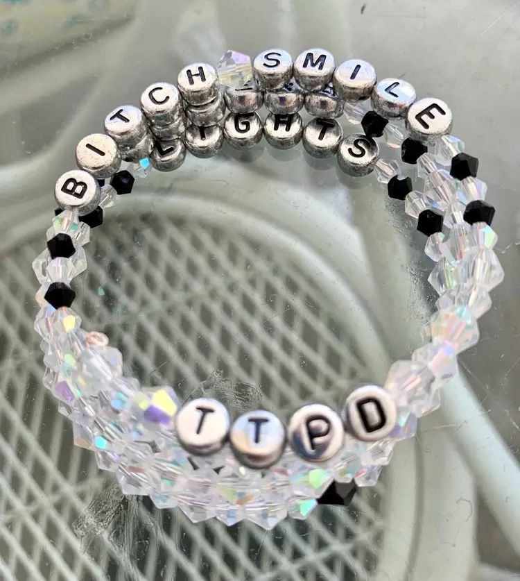 LIGHTS
CAMERA
BITCH SMILE
TTPD
Triple Wire Wrap Bracelet W 95 Crystals