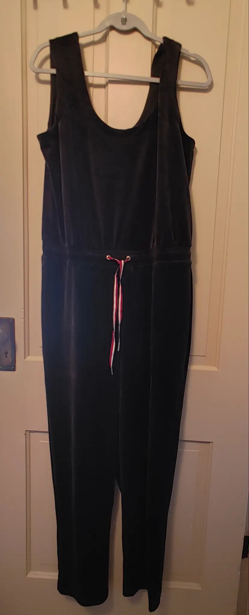 Romper- Brand: Tommy Hilfiger. Size Medium. NWT. Retail $79. Black velvet romper. Material: 95% polyester 5% elastane. No callouts.