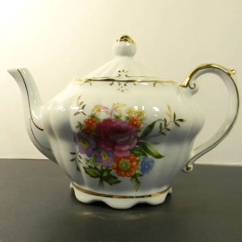 Porcelain Music Box Teapot-plays music- mfg by Tilso