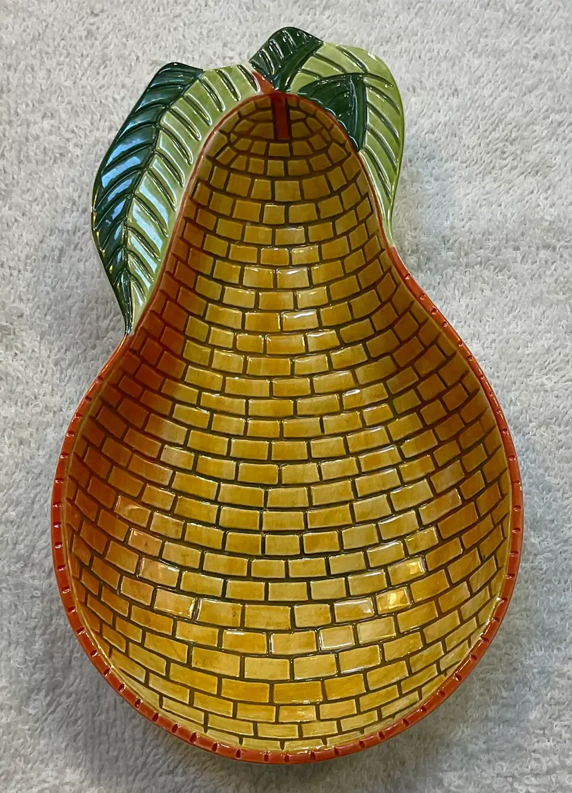 California Pottery pear with leaf. 8” long, 5” wide and 1.5” deep trinket dish.
