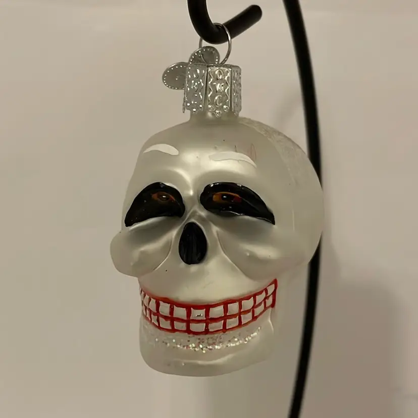 #106 Old World Christmas Glass Skull Ornament