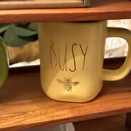 Busy be coffee mug by Rae Dunn